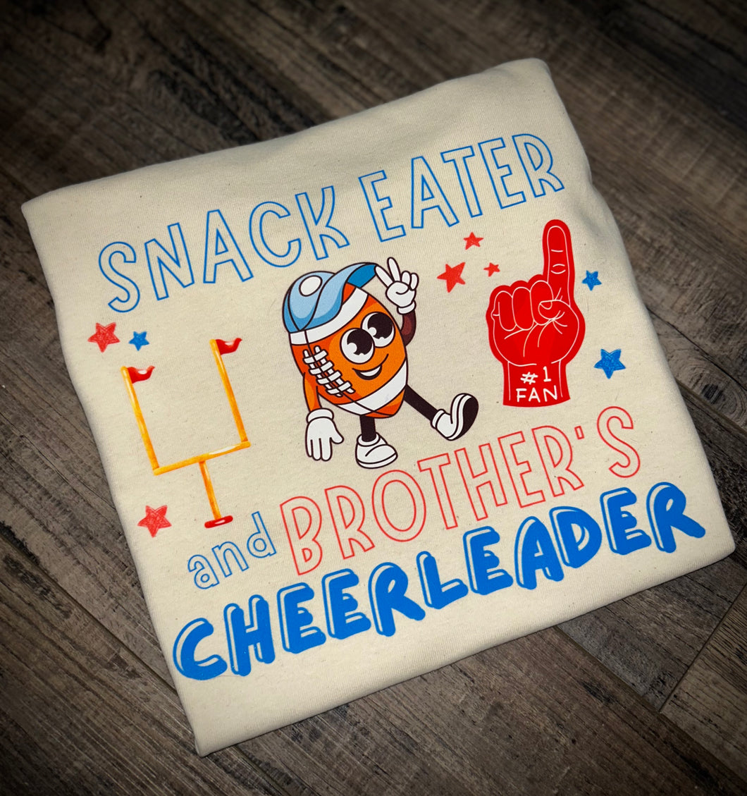 Snack Eater & Brother’s Cheerleader (football)