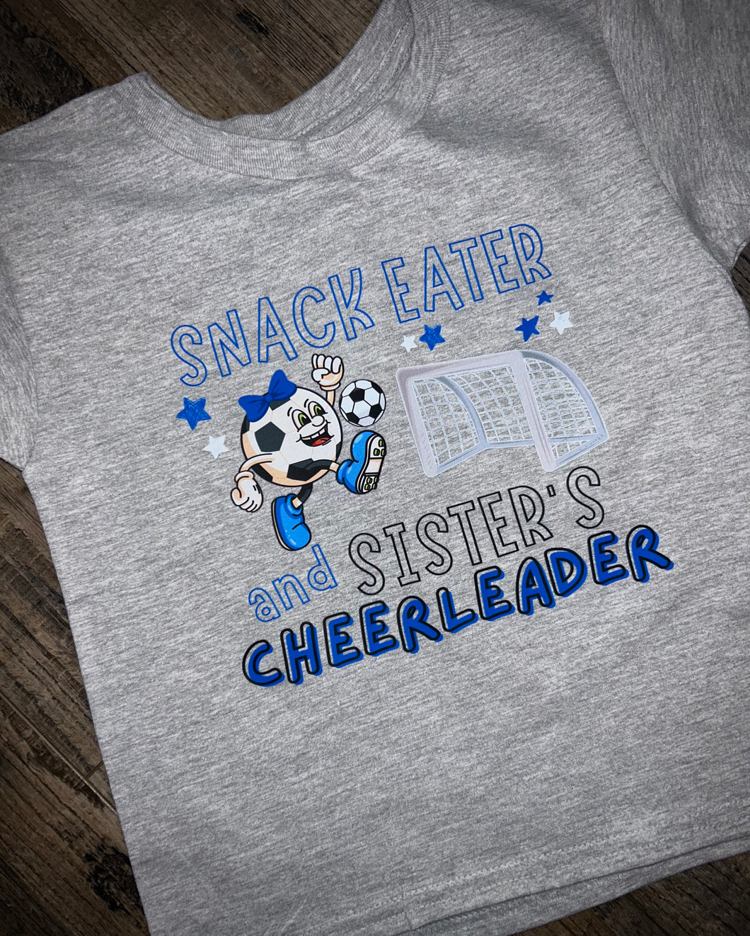 Snack Eater & Sister’s Cheerleader (soccer)