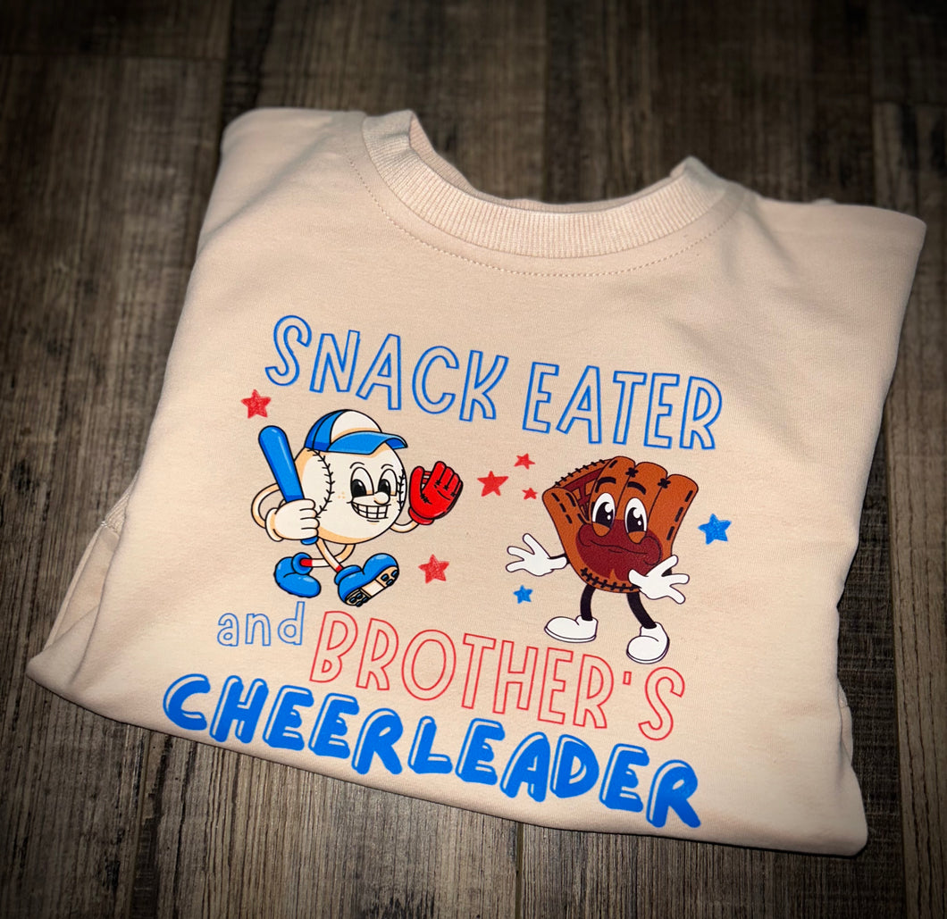 Snack Eater & Brother’s Cheerleader